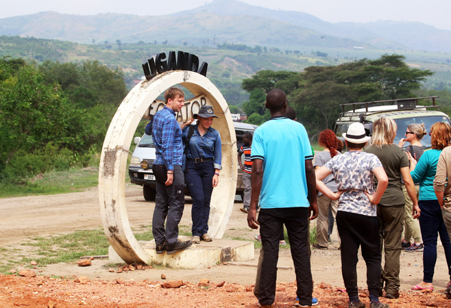 Standing on the Uganda Equator at Kayabwe