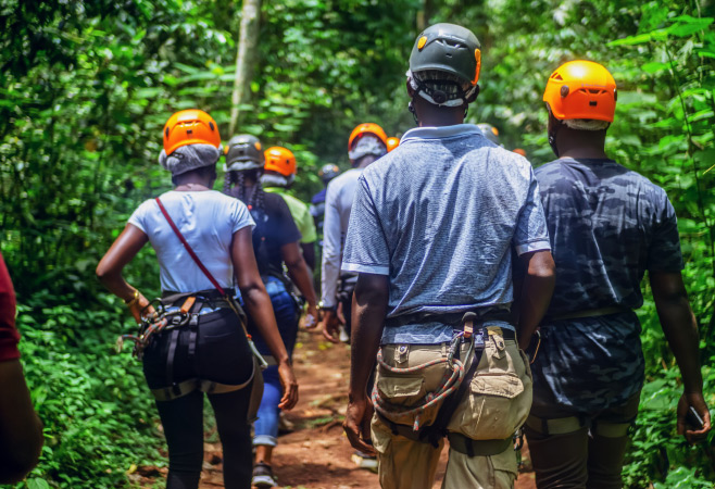 First-time zipliner celebrates the descent in Mukono
