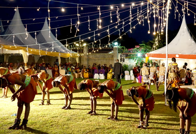 local performers in Uganda sing, dance and play traditional music at the wedding event