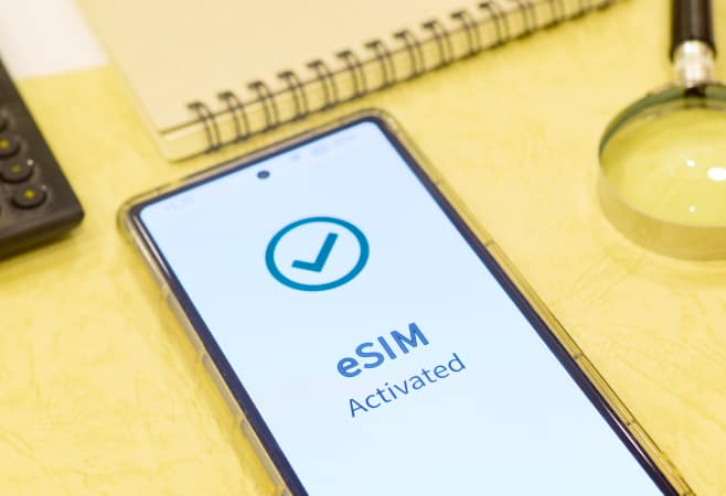 Mobile phone showing the message eSIM activated